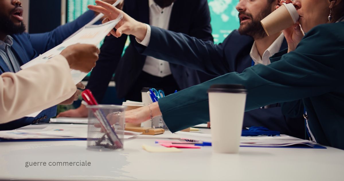 Business team reaching across a meeting table with papers and coffee cups, guerre commerciale