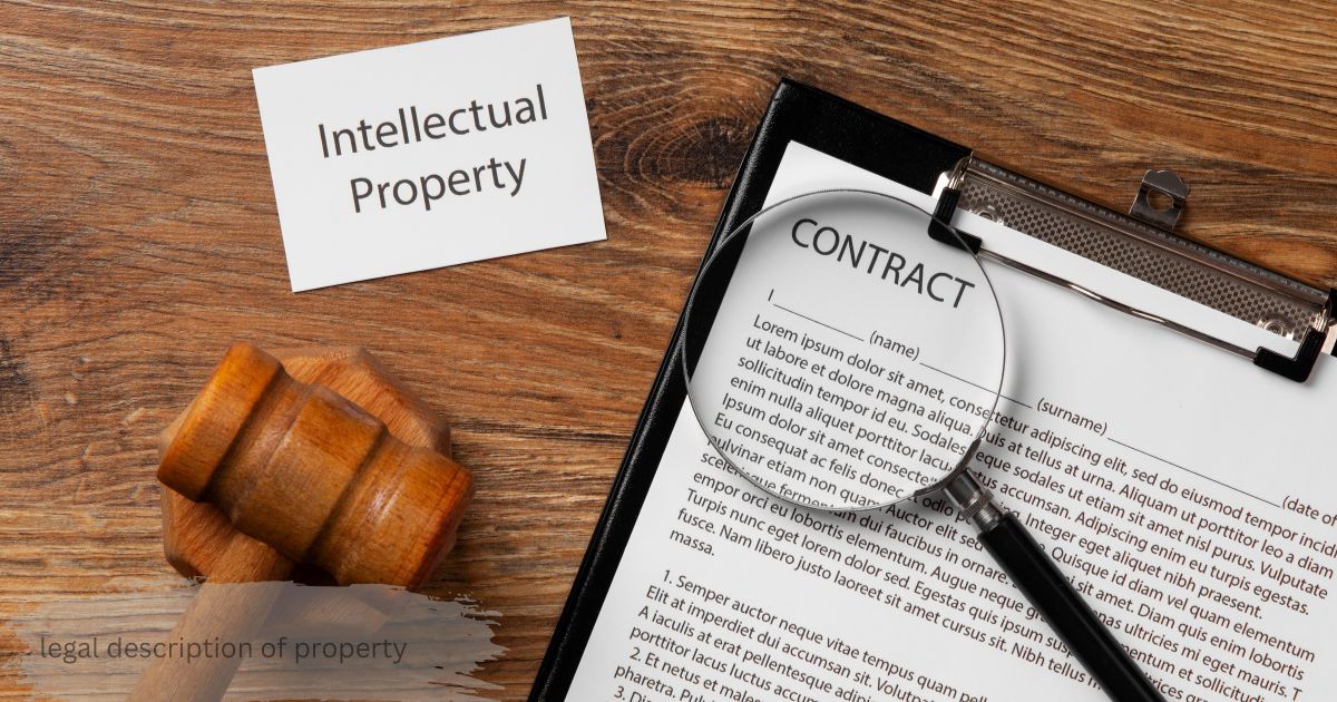  A contract document with a magnifying glass beside a gavel and an intellectual property card, illustrating how a legal description of property is reviewed in legal paperwork.