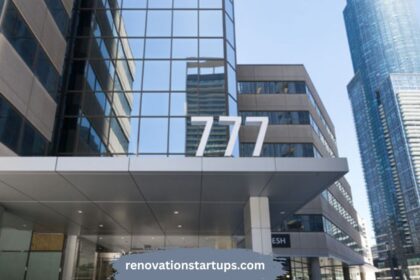 The modern exterior entrance of 777 Bay St office tower in downtown Toronto, featuring large white '777' building signage above the canopy.