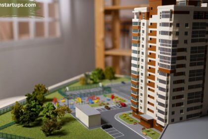 An architectural 3D miniature model of a modern high-rise development illustrating premium condos for sale in Winnipeg with integrated parking, green space, and a community playground area.