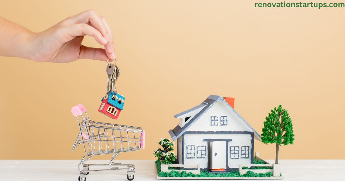 Hand holding keys with a miniature house keychain above a small shopping cart next to a model family home, symbolizing a competitive house for sale Saskatoon real estate market.