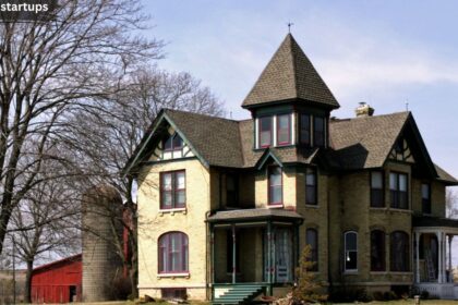 Victorian-style yellow brick house with turret and wraparound porch, an example of historic character homes for a maison a vendre Granby search