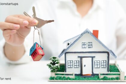 House keys being handed over next to a rental property model — find a house for rent in Canada