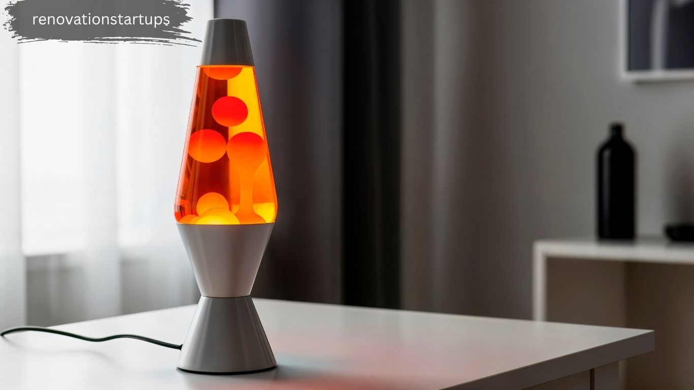 Lava light lamp with orange wax blobs rising in glass vessel on a table – retro-chic home decor