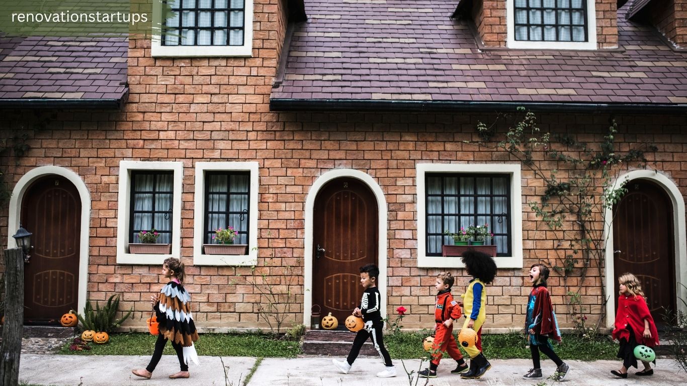 Children trick-or-treating in front of a brick residential building near 10 York Street Toronto waterfront neighbourhood
