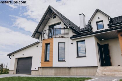 Modern townhouse for sale with garage, balcony, and contemporary exterior design