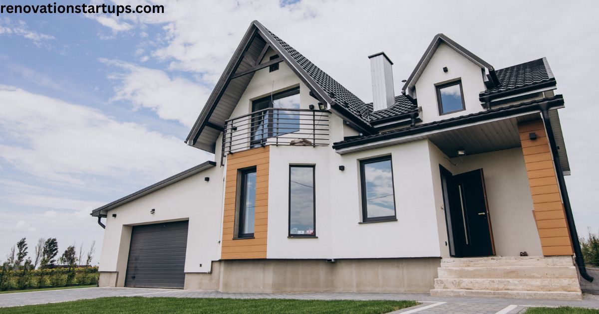 Modern townhouse for sale with garage, balcony, and contemporary exterior design