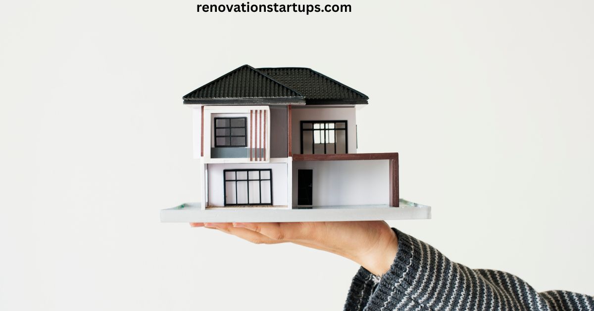Person holding model house symbolizing houses for rent near me search