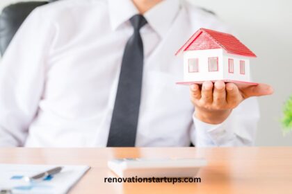 Houses for sale Medicine Hat real estate agent holding model home