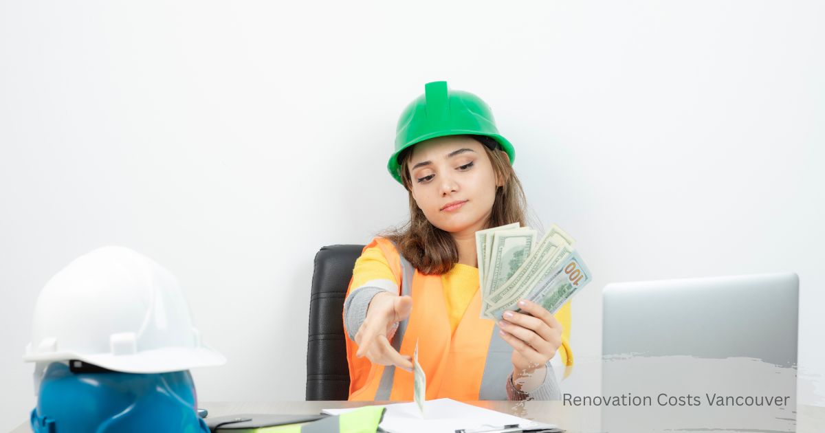 Female general contractor holding cash and using a calculator to plan budget and renovation costs vancouver