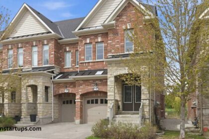 1331 Major Mackenzie Dr 126 – brick and stone end-unit townhome exterior in Vaughan with double garage and covered entrance