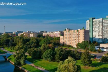 3883 Quartz Rd, Mississauga ON aerial view of a residential condo neighbourhood with modern towers, a riverside walking path, and green parks.