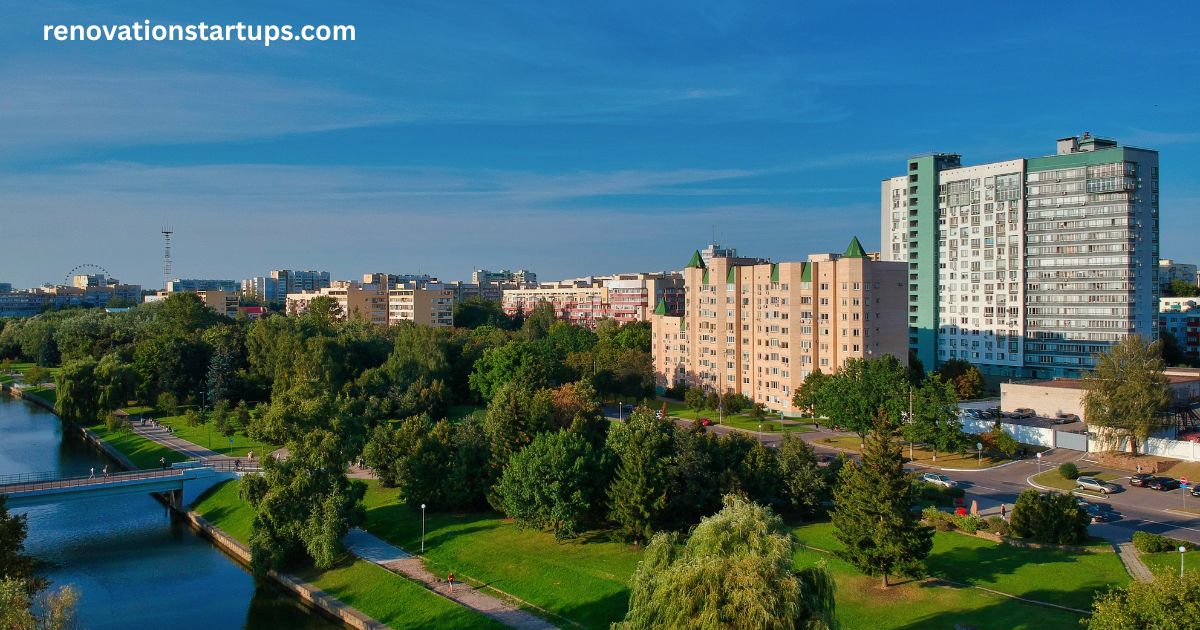 3883 Quartz Rd, Mississauga ON aerial view of a residential condo neighbourhood with modern towers, a riverside walking path, and green parks.