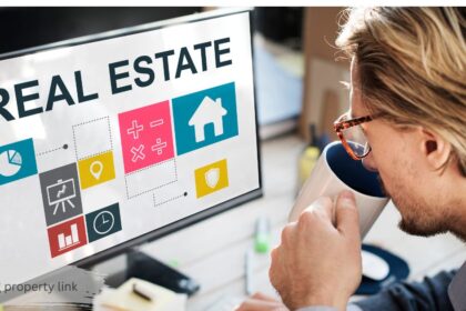 Man reviewing EG Property Link real estate data and commercial property icons on a computer screen
