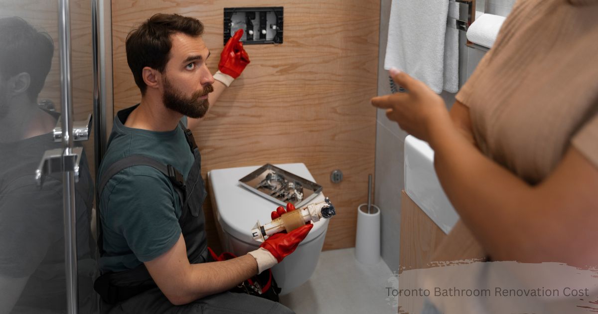 Toronto bathroom renovation cost: plumber repairing toilet cistern while homeowner looks on