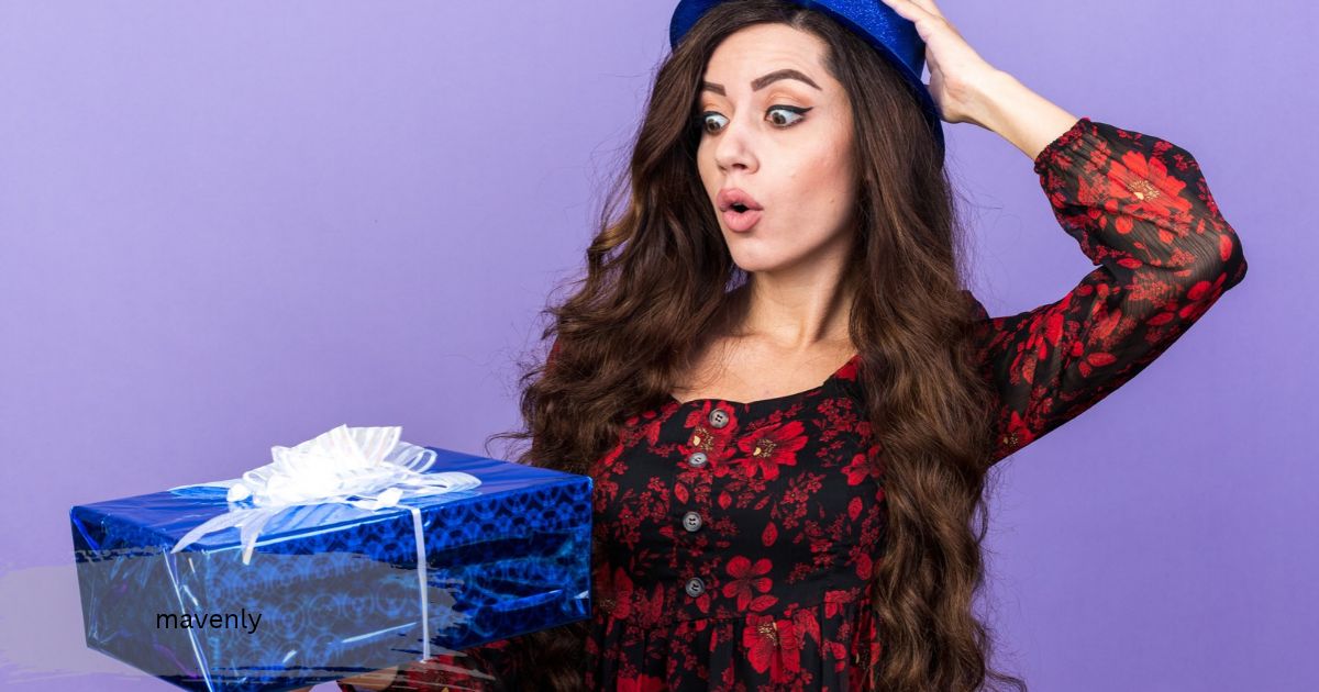 surprised woman in a blue party hat looking at a wrapped gift box, a mavenly gift idea
